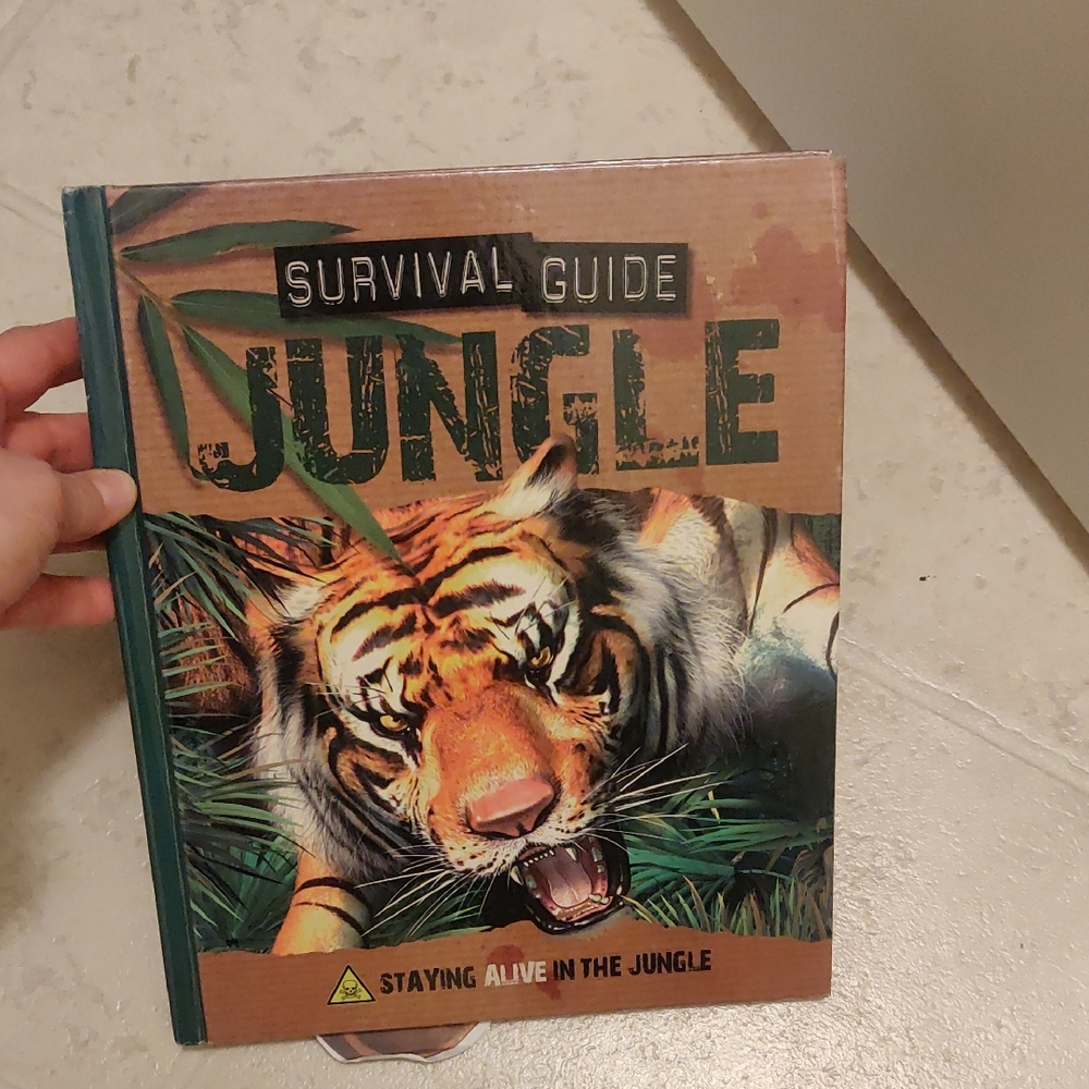 Jungle Survival Guide hardcover pop up Colorful, Educational book.
